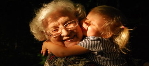 Grandma holding a child