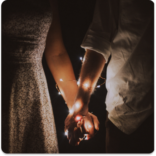 holding hands with lights